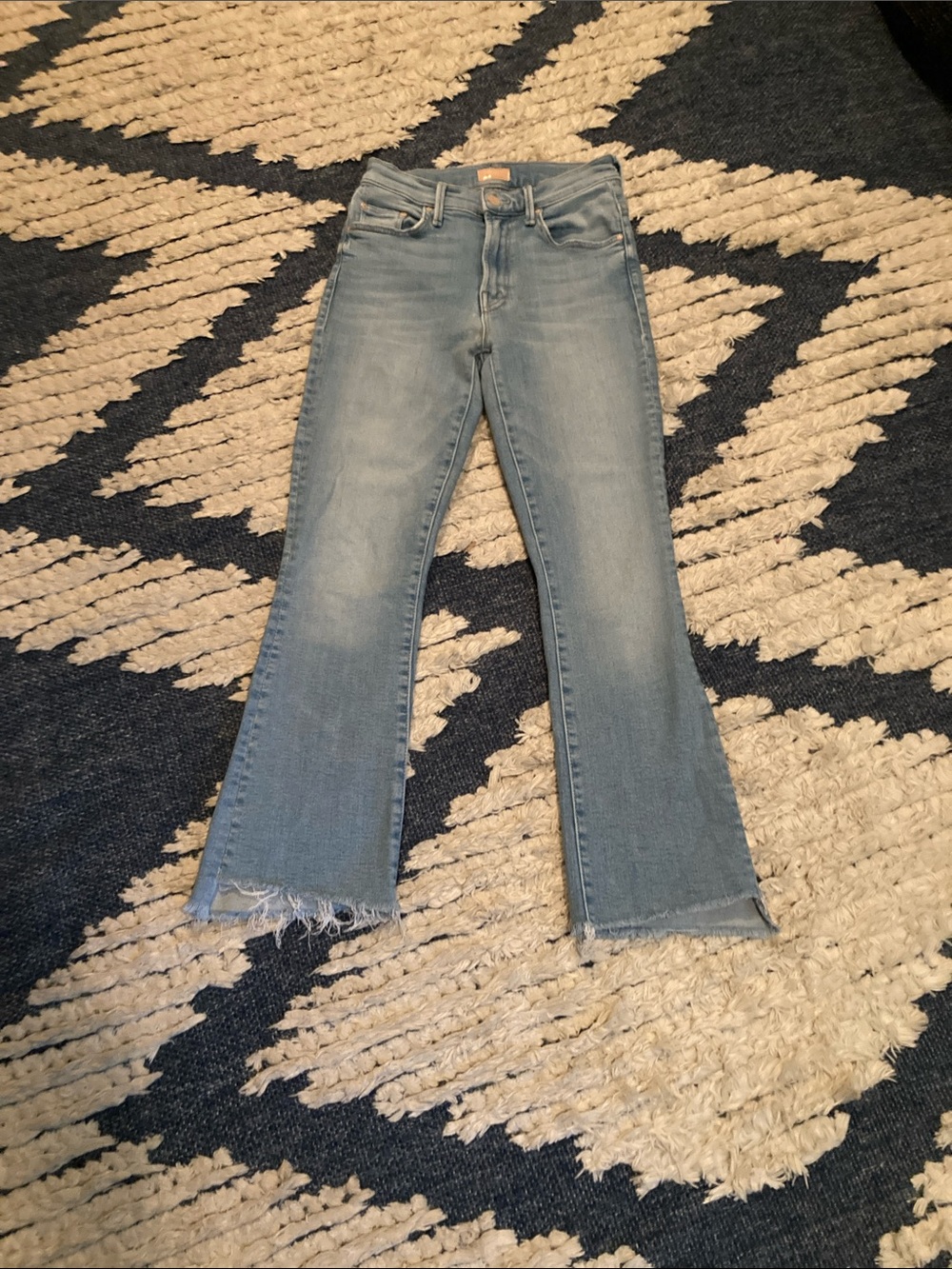 MOTHER Light Blue High-Rise Flare Jeans with Raw Hem